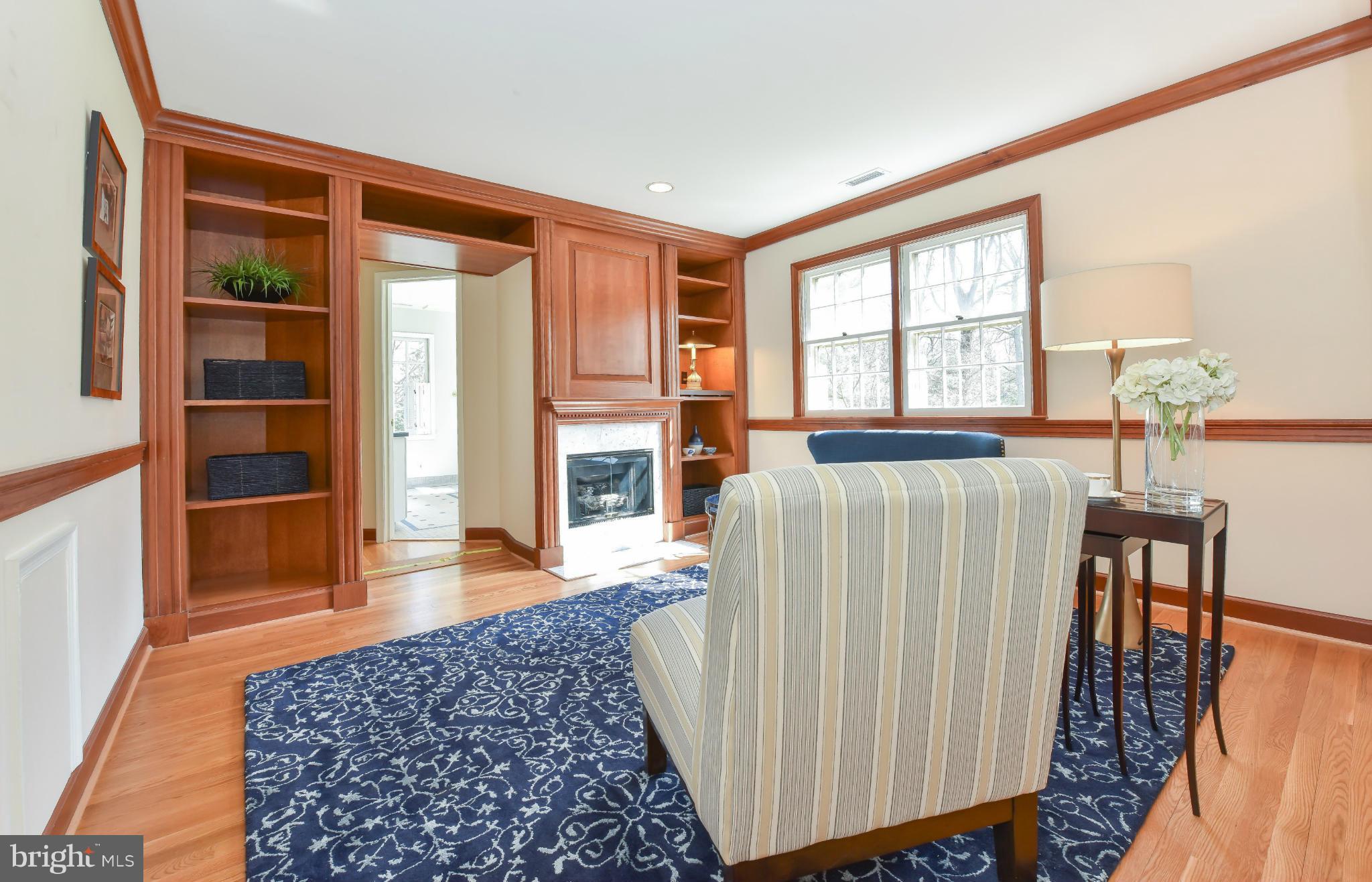 7704 Burford Drive McLean, VA 22102 - Photo 13 of 30 a living room with furniture and a window