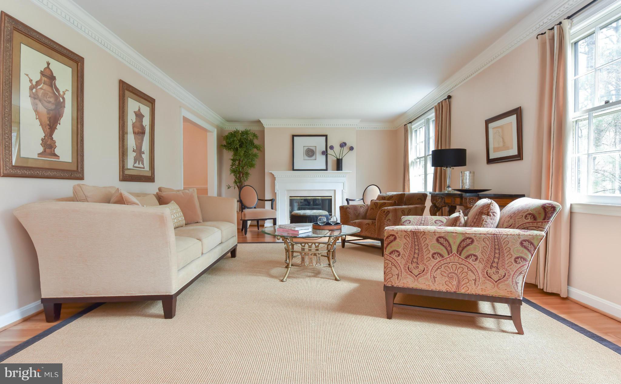 7704 Burford Drive McLean, VA 22102 - Photo 3 of 30 a living room with furniture and a large window