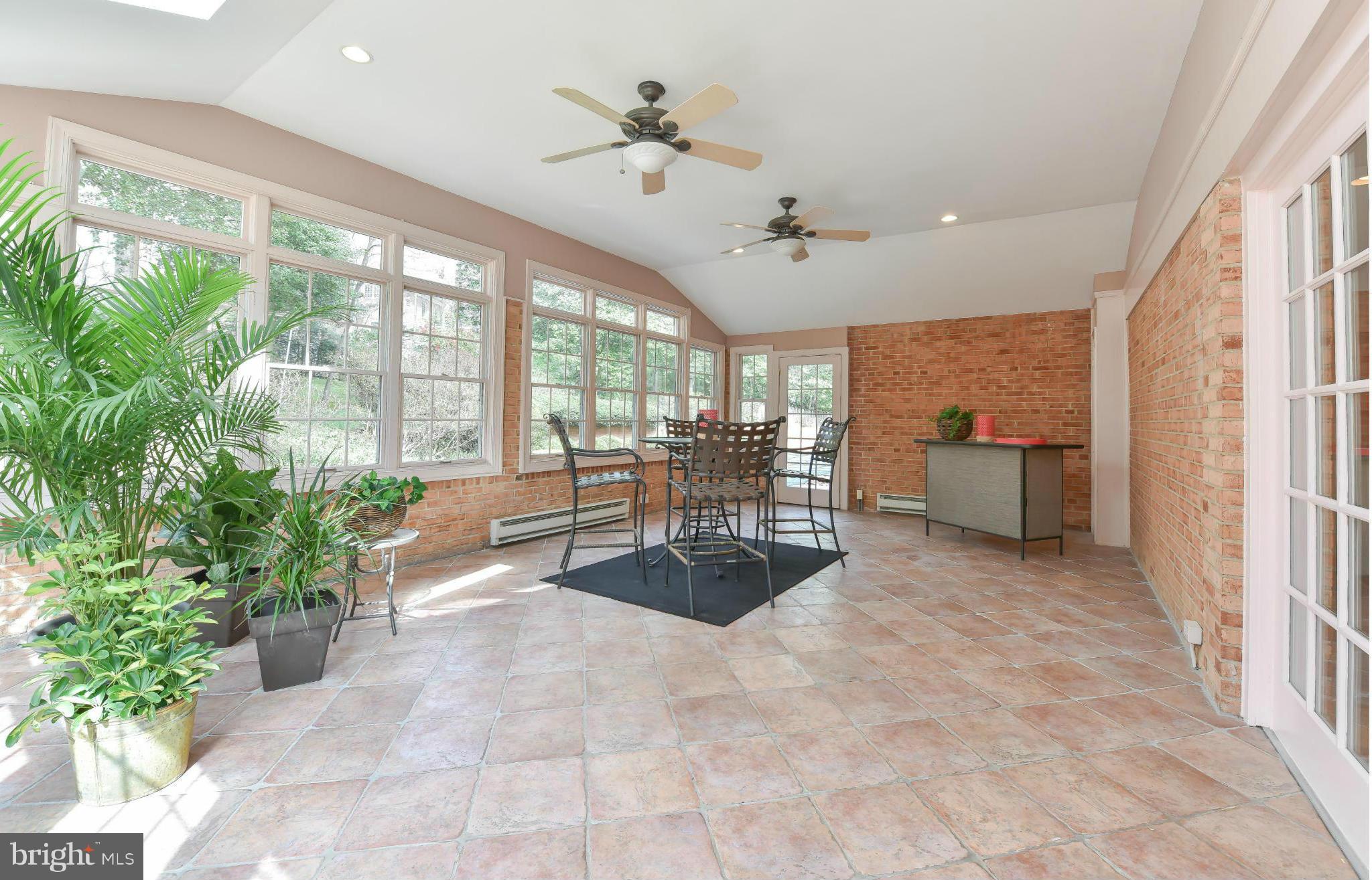 7704 Burford Drive McLean, VA 22102 - Photo 22 of 30 a living room with furniture and a large window