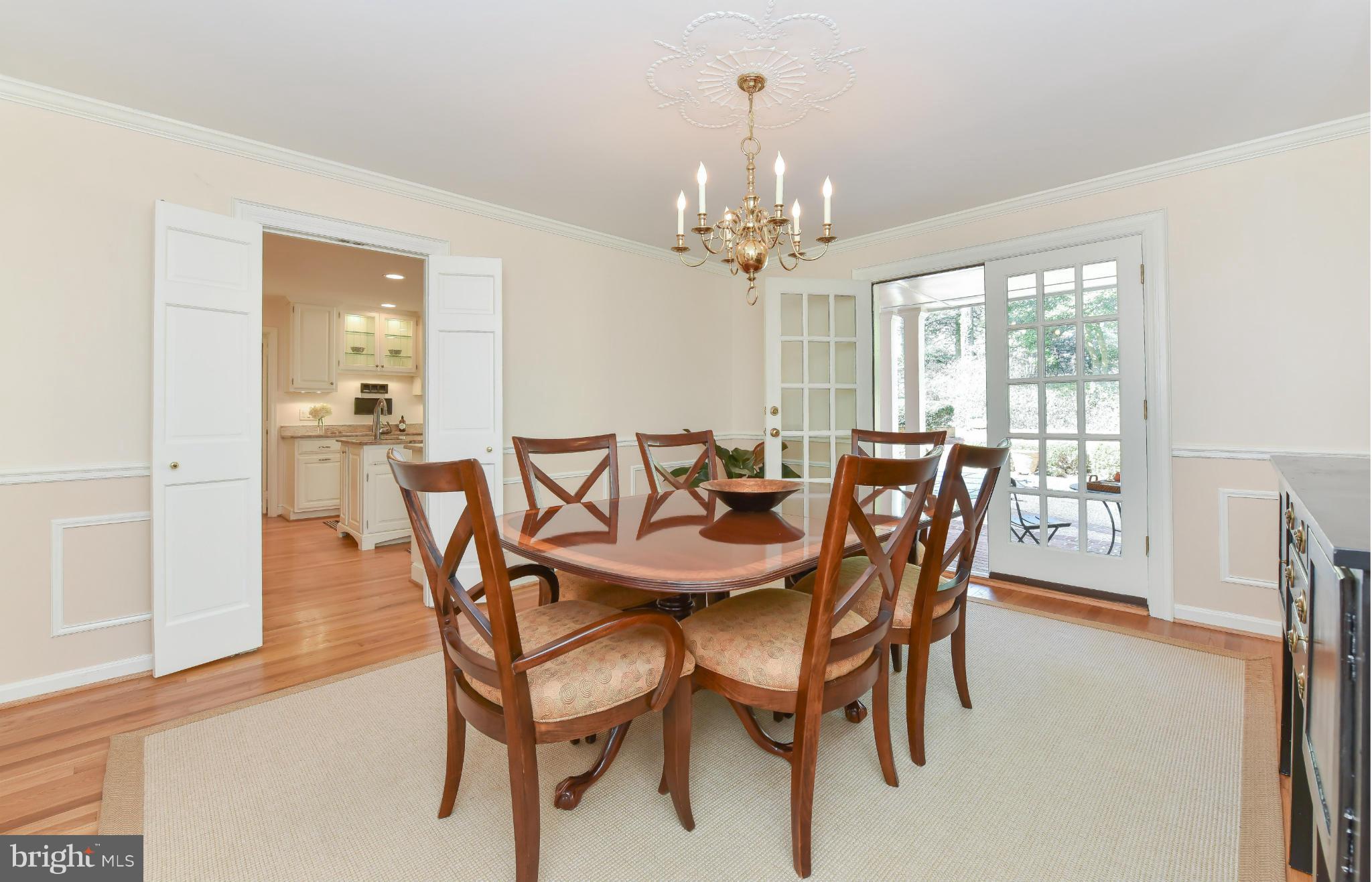 7704 Burford Drive McLean, VA 22102 - Photo 5 of 30 a view of a dining room with furniture window and outside view