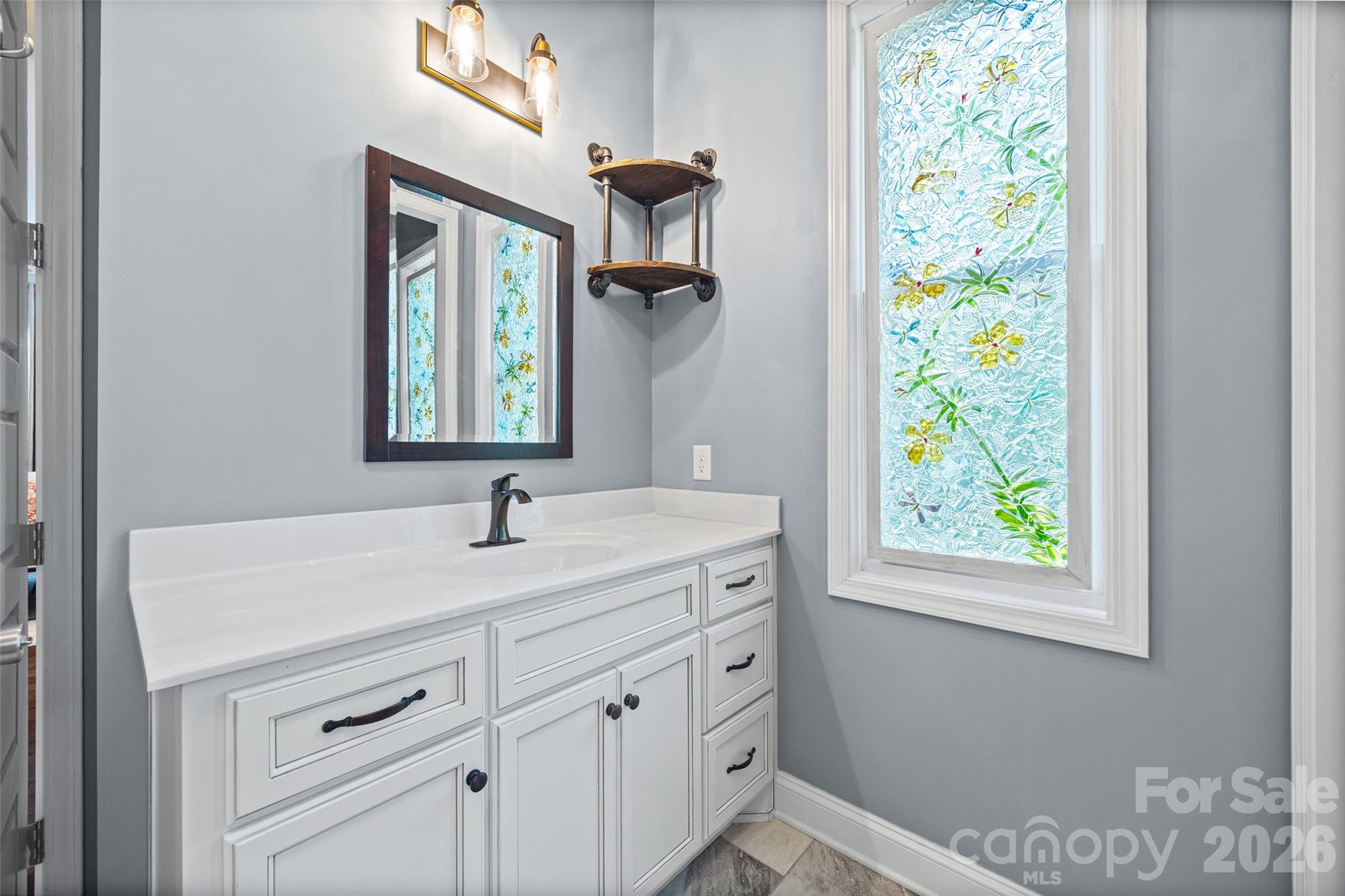 790 Brandon Road Clover, SC 29710 - Photo 26 of 43 a bathroom with a sink and a window