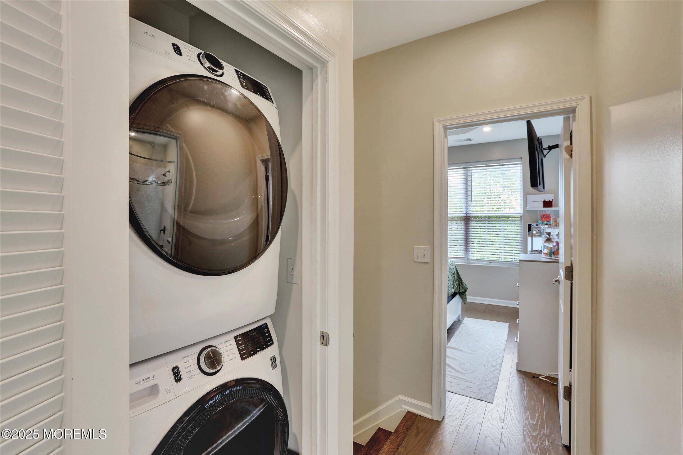 303 Prosper Way, Unit 203 Brick, NJ 08723 - Photo 23 of 36 a utility room with dryer and washer