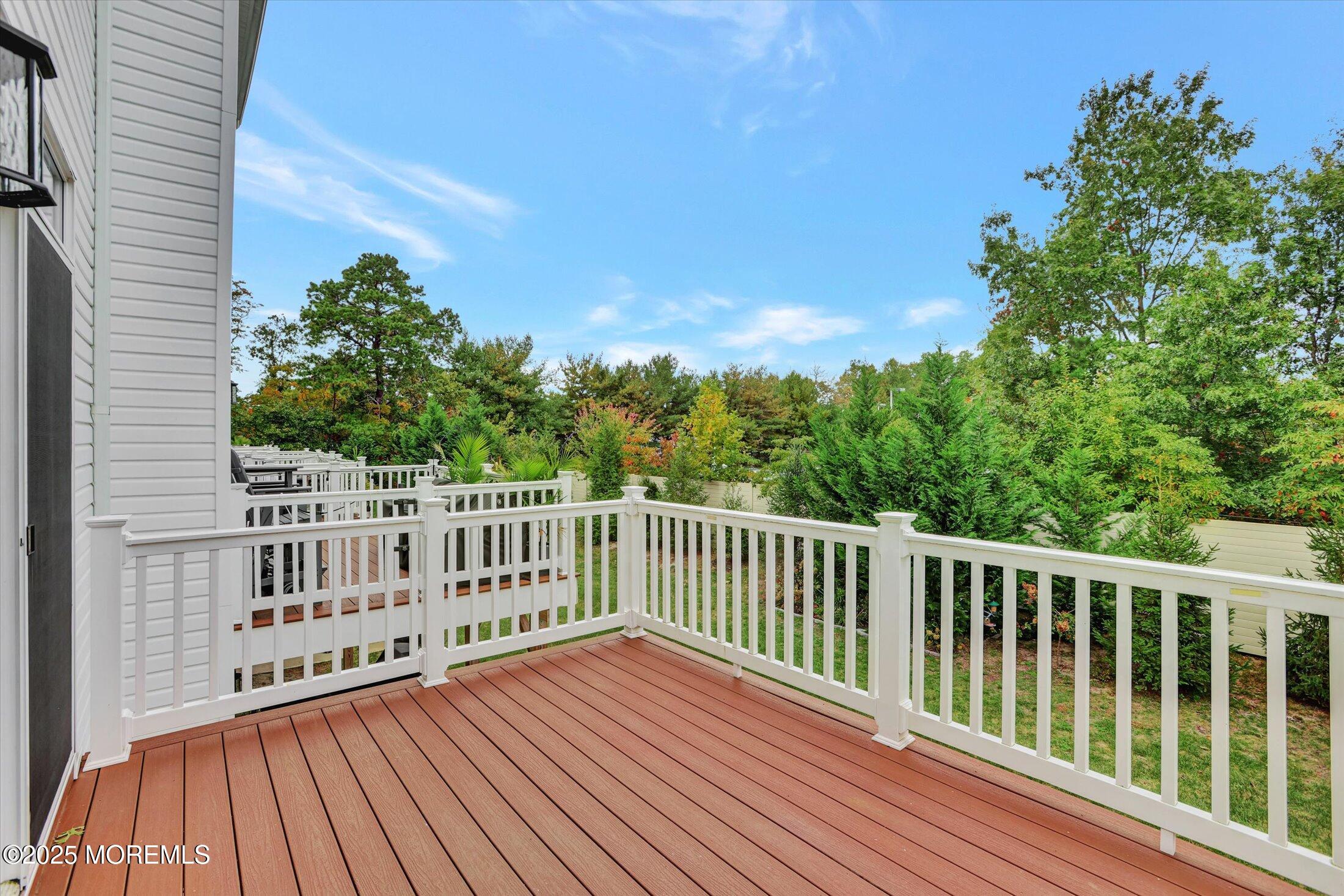 303 Prosper Way, Unit 203 Brick, NJ 08723 - Photo 24 of 36 a view of wooden deck