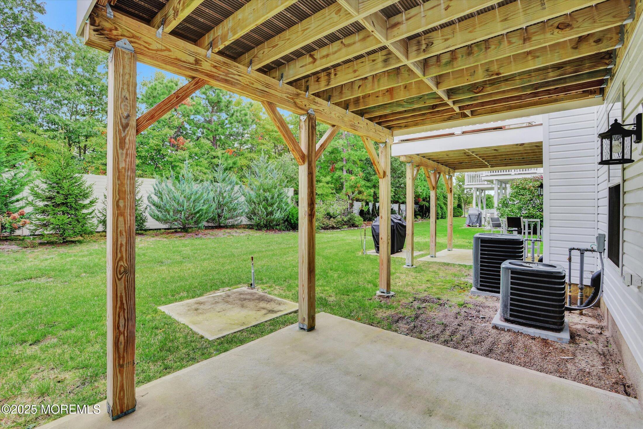 303 Prosper Way, Unit 203 Brick, NJ 08723 - Photo 28 of 36 a view of porch with a backyard