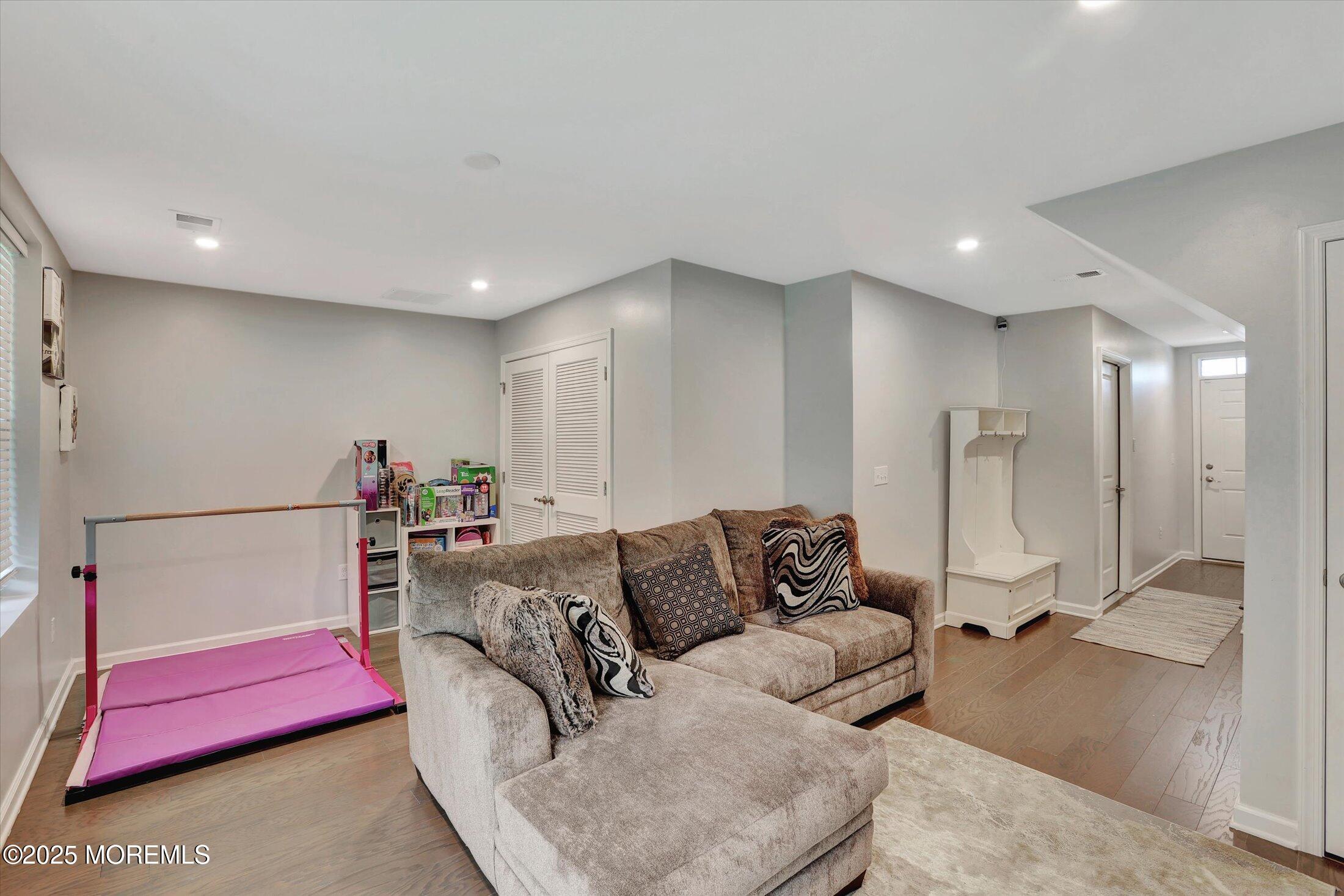 303 Prosper Way, Unit 203 Brick, NJ 08723 - Photo 3 of 36 a living room with furniture