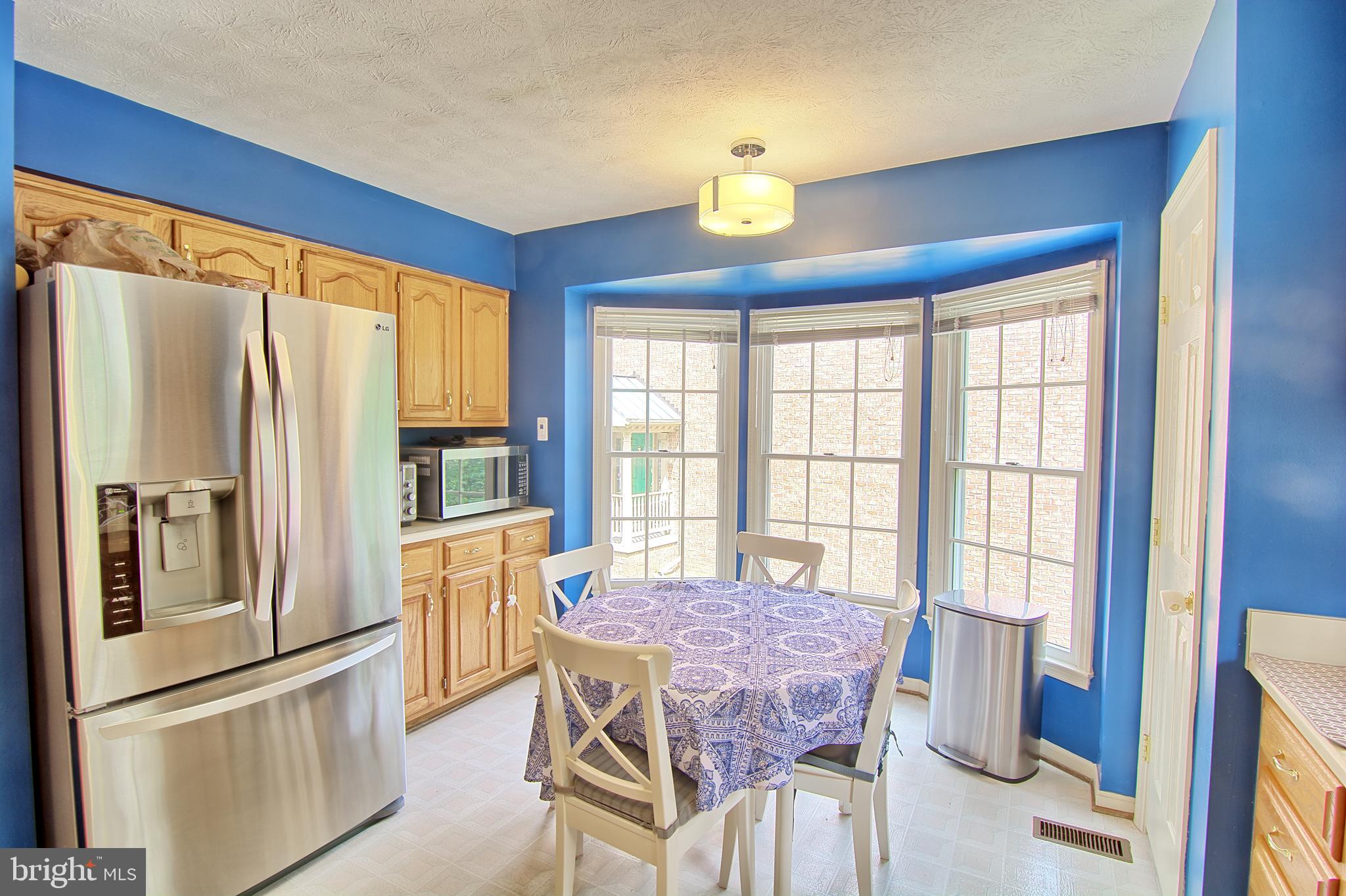2733 Quarry Heights Way Baltimore, MD 21209 - Photo 11 of 38 Bright Eat-in Kitchen w/ Bay Window