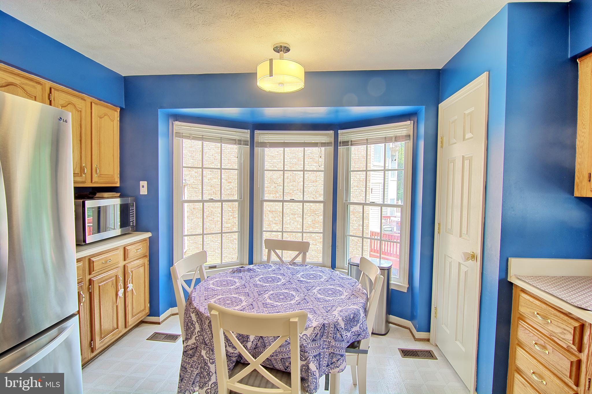 2733 Quarry Heights Way Baltimore, MD 21209 - Photo 13 of 38 Bright Eat-in Kitchen w/ Bay Window