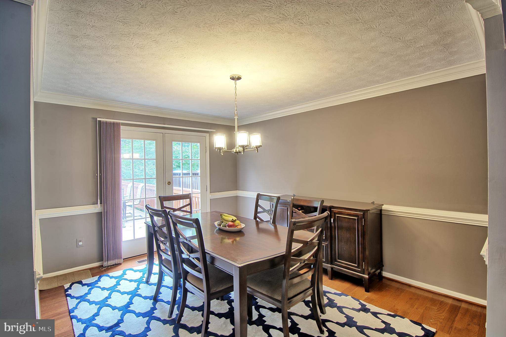 2733 Quarry Heights Way Baltimore, MD 21209 - Photo 15 of 38 Dining Room opens to over-sized Deck & Living Rm