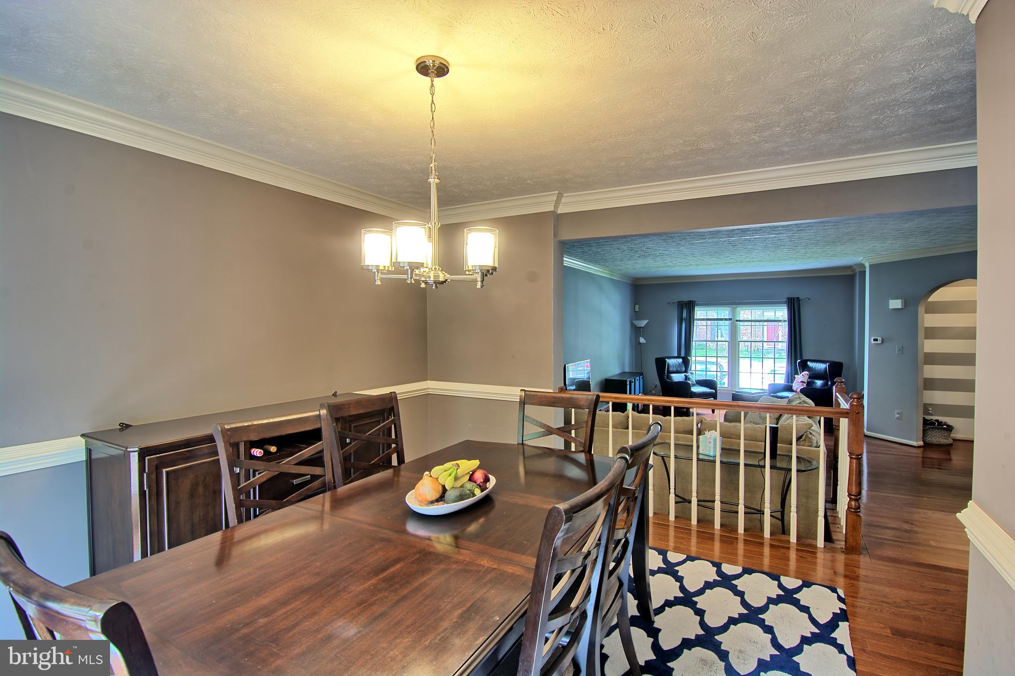 2733 Quarry Heights Way Baltimore, MD 21209 - Photo 16 of 38 Dining Room opens to over-sized Deck & Living Rm
