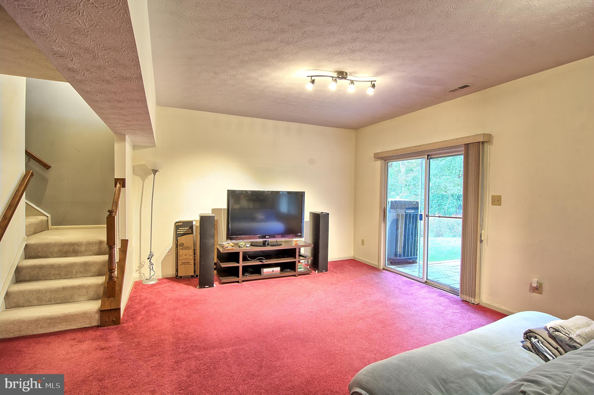 2733 Quarry Heights Way Baltimore, MD 21209 - Photo 31 of 38 Finished Basement w 9" Ceiling and Walkout