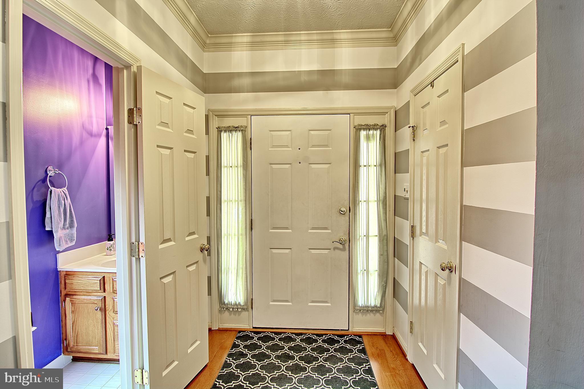 2733 Quarry Heights Way Baltimore, MD 21209 - Photo 5 of 38 Large open Foyer w/ Main Level Powder Room