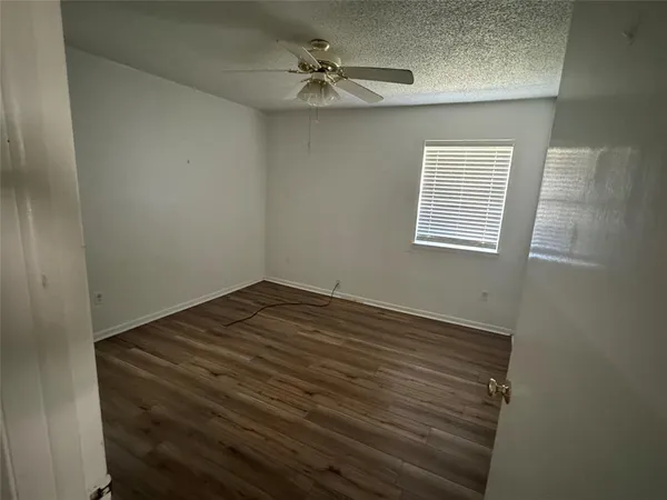 a front view of a house with a yard table and chairs