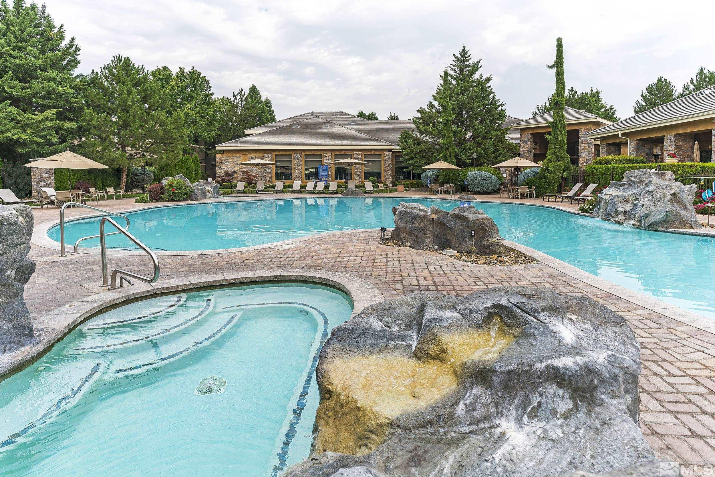 900 South Meadows Parkway, Unit 1621 Reno, NV 89521 - Photo 17 of 23 a view of a swimming pool with a patio
