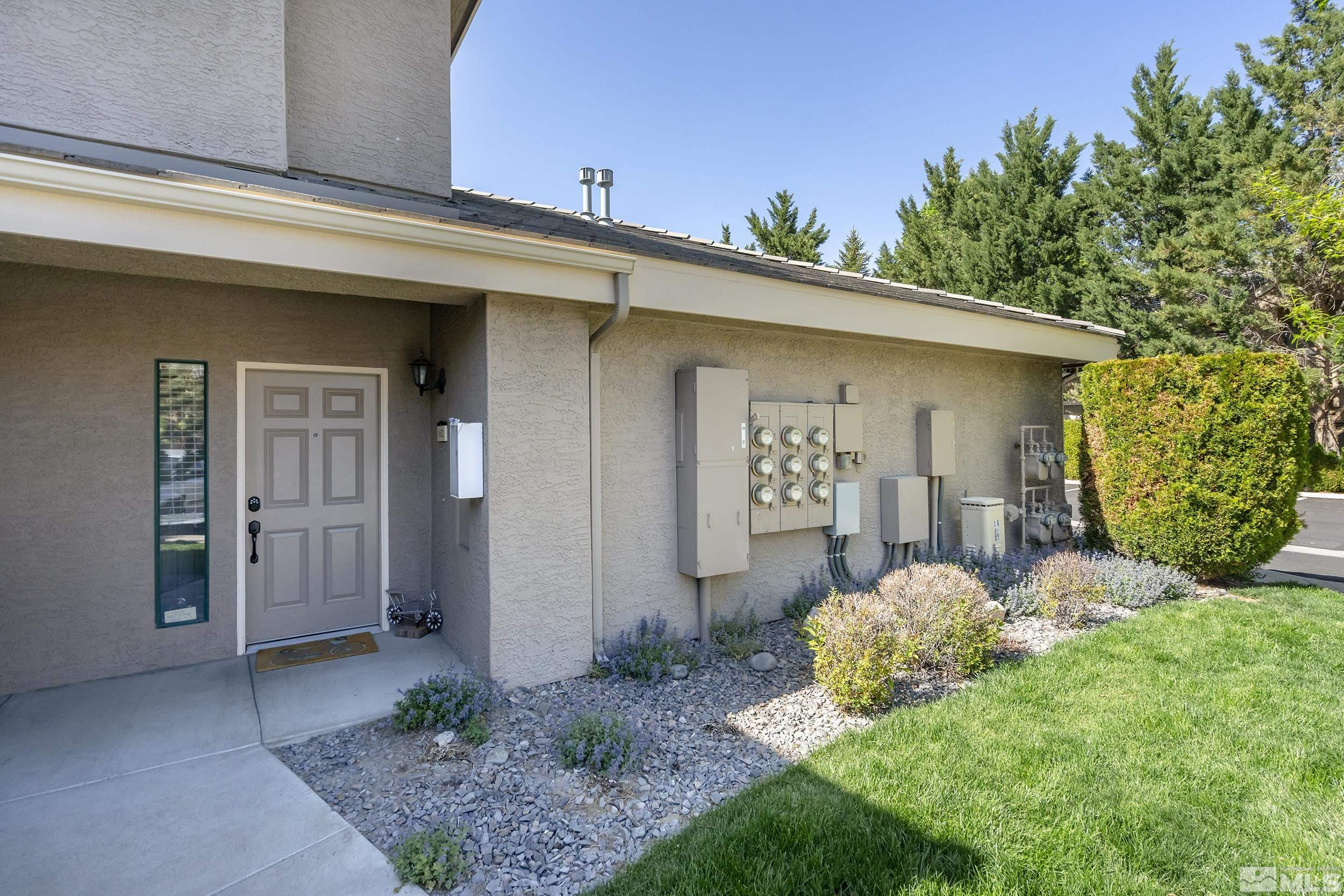 900 South Meadows Parkway, Unit 1621 Reno, NV 89521 - Photo 23 of 23 a front view of a house with garden