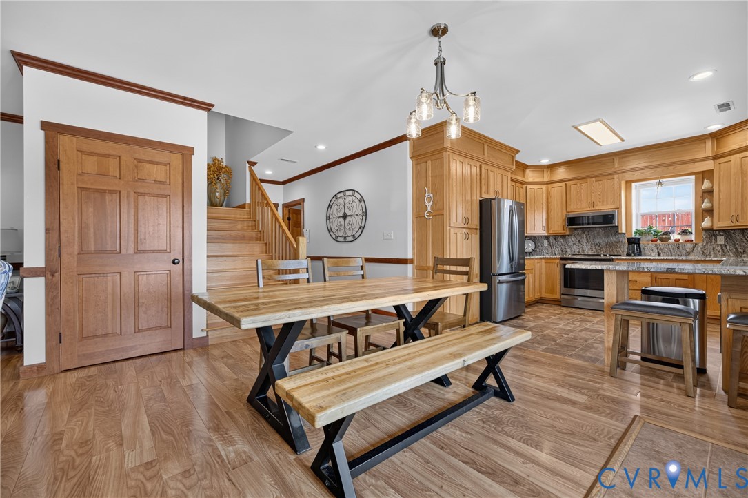 1292 Mohawk Road Long Island, VA 24569 - Photo 47 of 95 Open-concept kitchen and dining area featuring woo