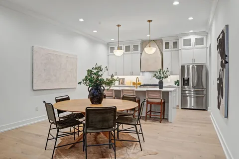a bathroom with a sink vanity and a mirror
