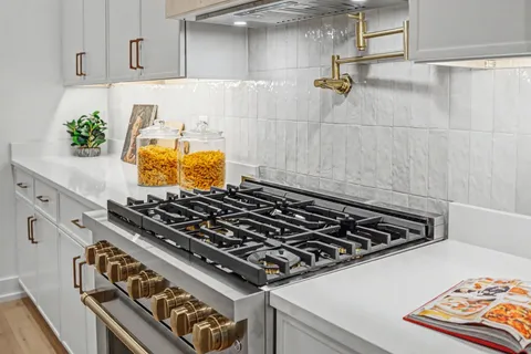 a bedroom with a bed and a fireplace