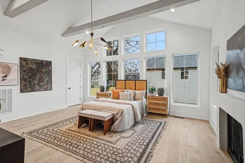 a view of a hallway with furniture