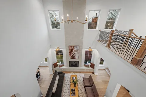 a view of a patio with a table and chairs