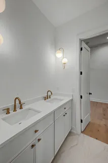 a bathroom with a sink a toilet and a bathtub