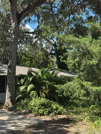 a view of a house with a swimming pool