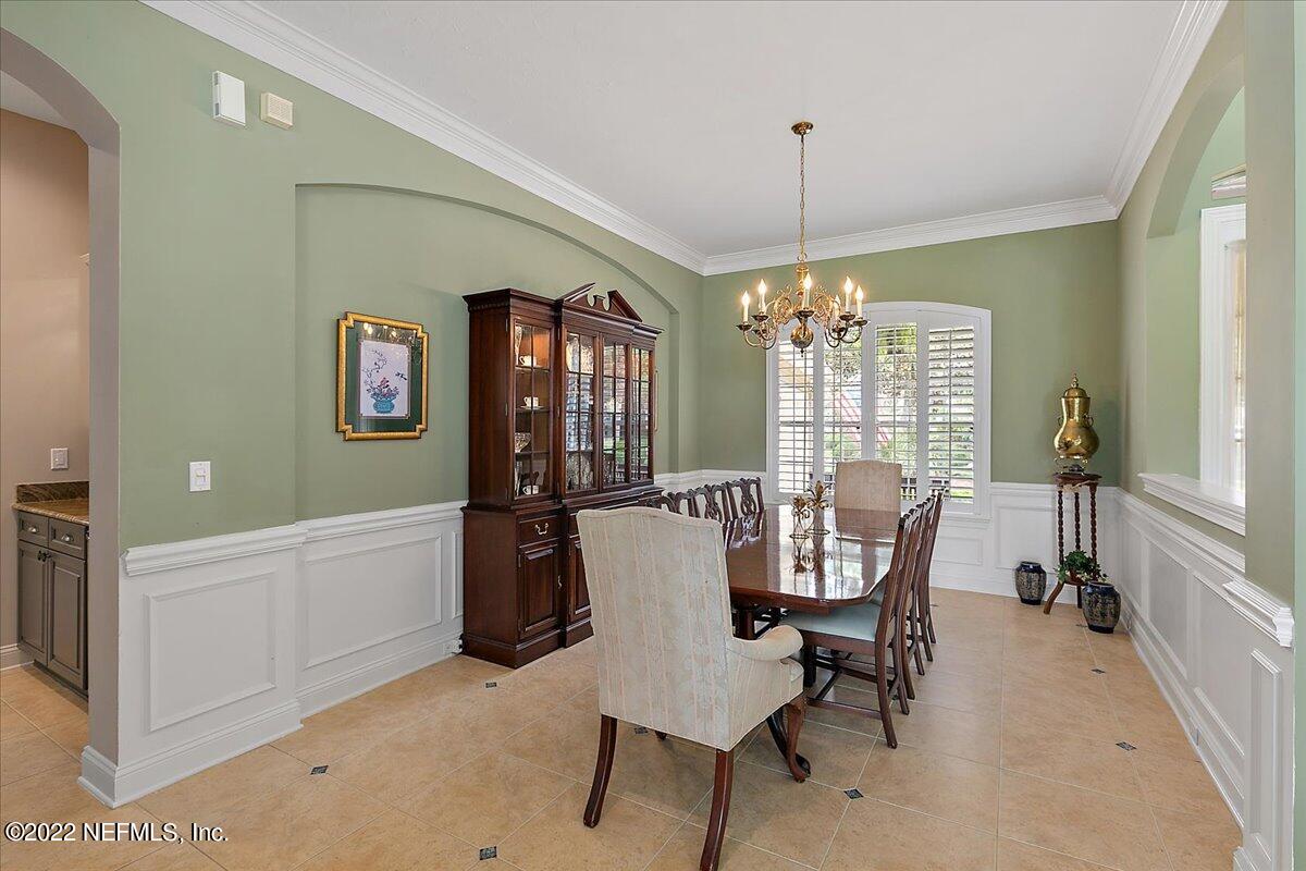 649 Treehouse Circle St. Augustine, FL 32095 - Photo 11 of 71 a view of a dining room with furniture window and outside view