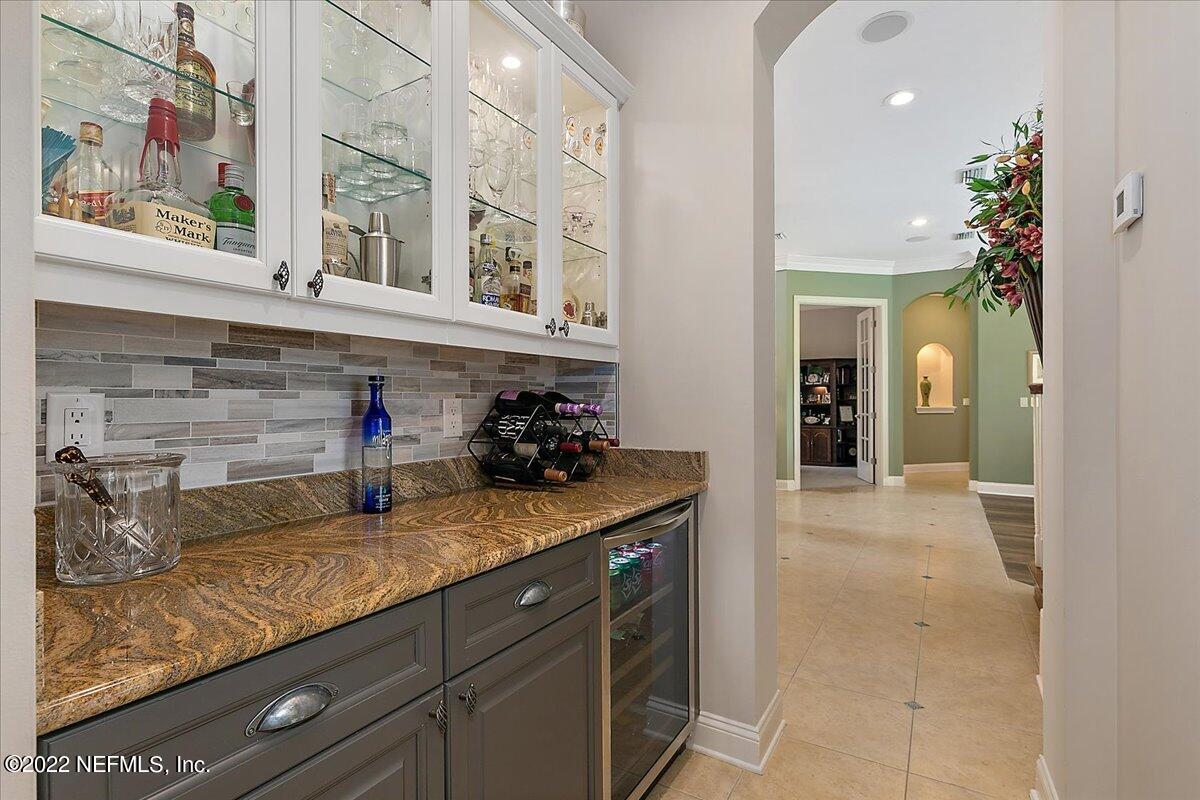 649 Treehouse Circle St. Augustine, FL 32095 - Photo 26 of 71 a kitchen with sink and cabinets