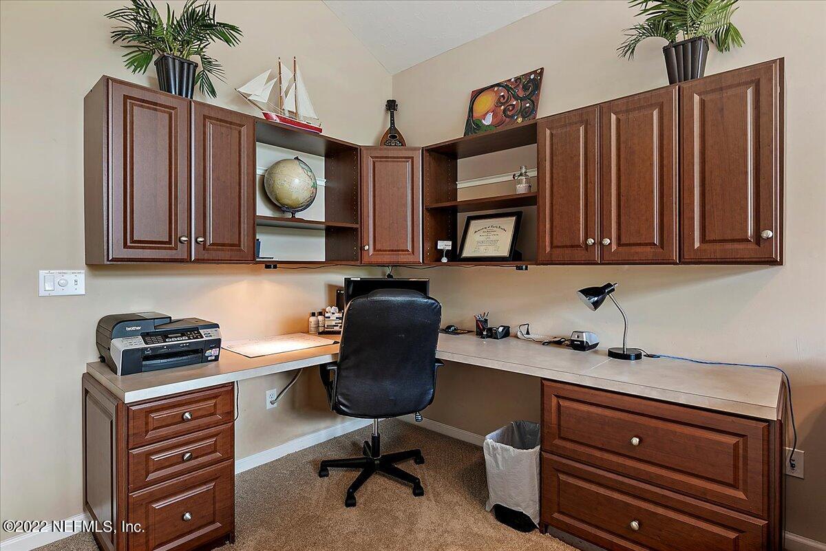 649 Treehouse Circle St. Augustine, FL 32095 - Photo 41 of 71 a view of a workspace with furniture