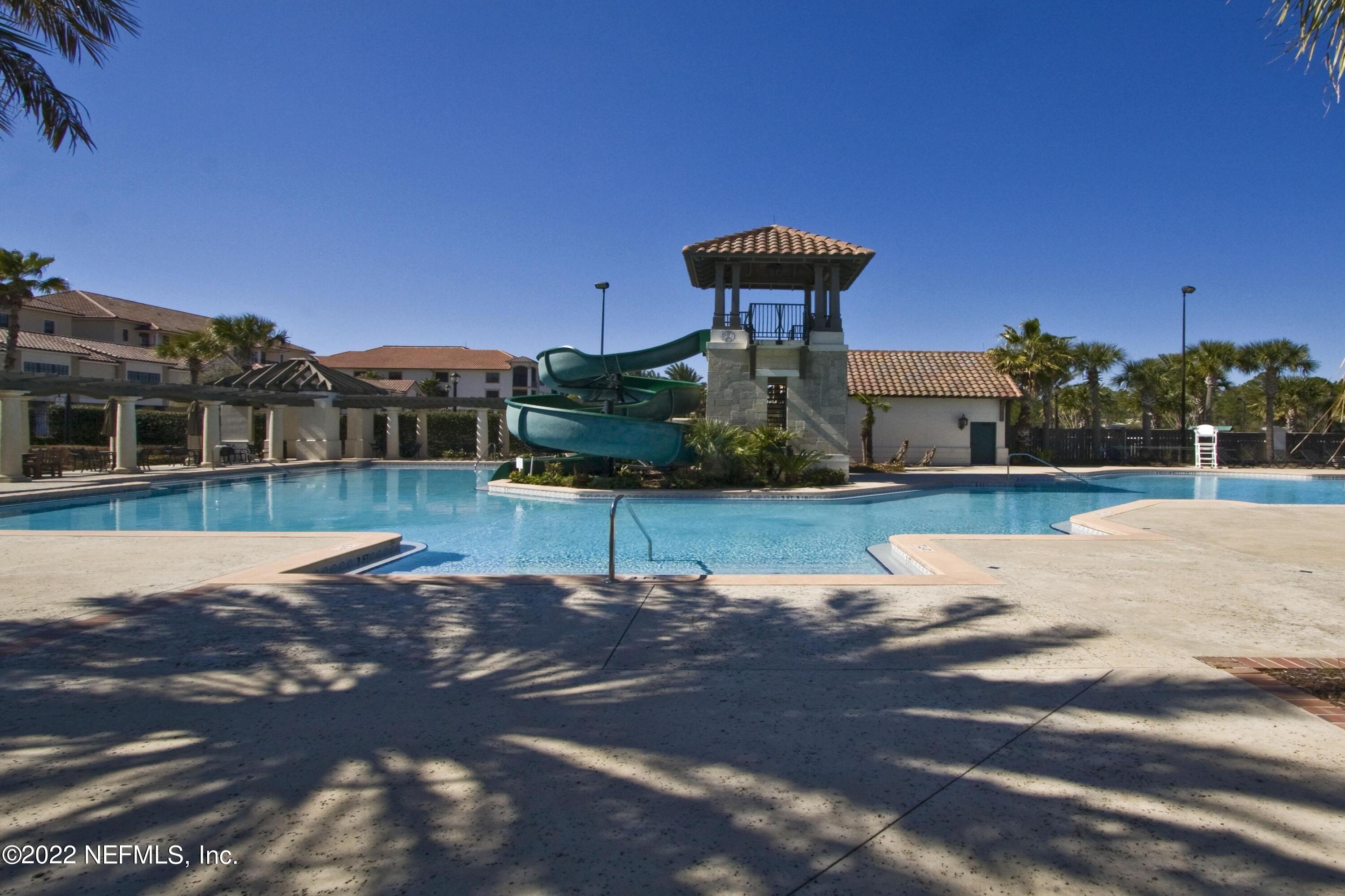 649 Treehouse Circle St. Augustine, FL 32095 - Photo 63 of 71 a view of a house with a yard