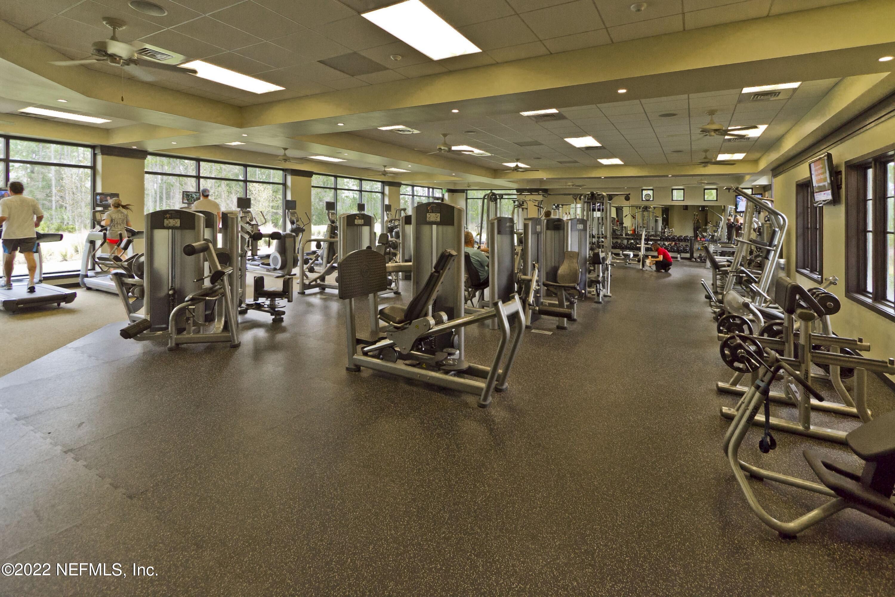 649 Treehouse Circle St. Augustine, FL 32095 - Photo 64 of 71 a view of a room with gym equipment