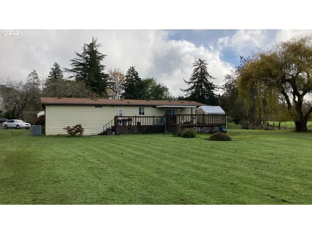 a black and white photo of a house