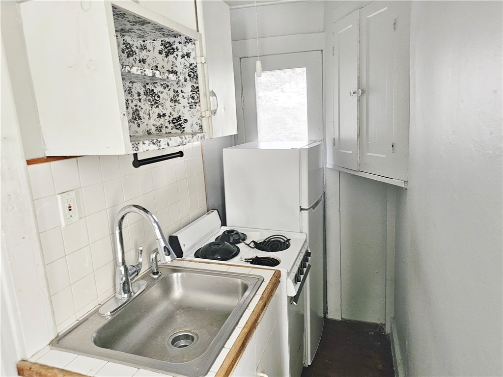 204 Cypress Street Rochester, NY 14620 - Photo 18 of 40 unit 208 galley kitchen