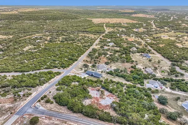 an aerial view of a house having yard