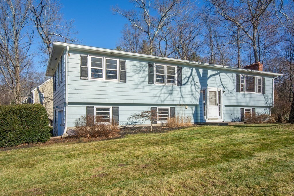 54 Carpenter Road Northbridge, MA 01588 - Photo 7 of 42 a house view with a garden space