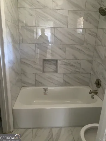 a bathroom with a bathtub
