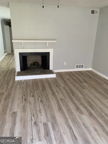a room with a fireplace