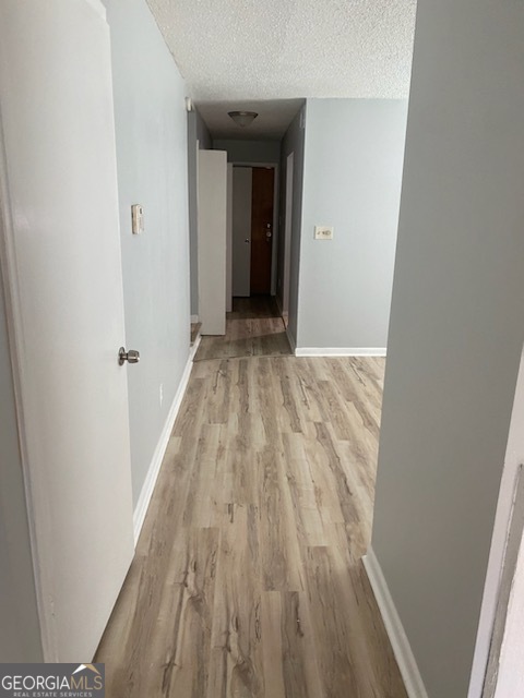 34 Quail Run Decatur, GA 30035 - Photo 18 of 21 a view of a hallway in wooden floor