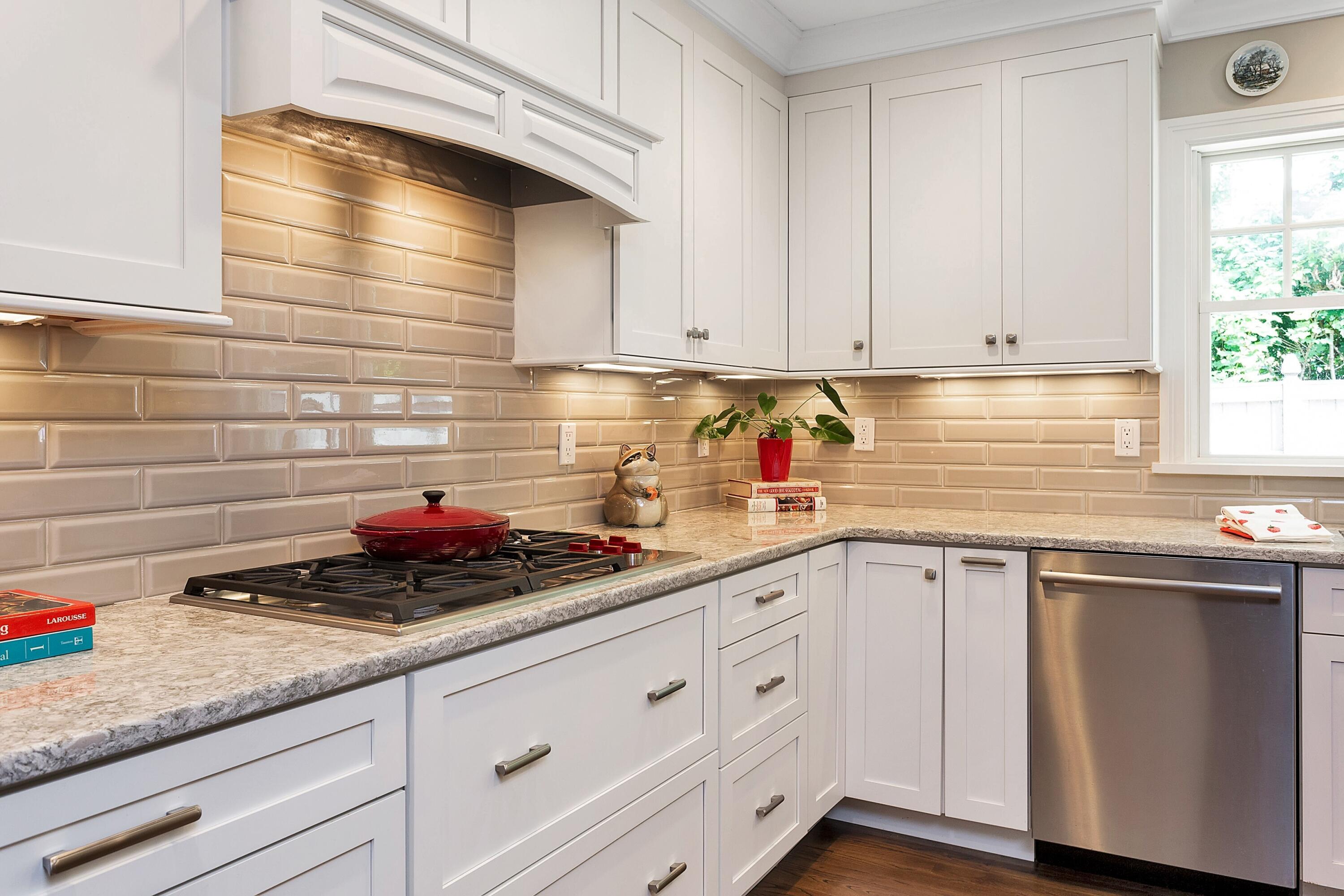2 Cedar Gate Road Darien, CT 06820 - Photo 11 of 42 a kitchen with granite countertop white cabinets and white appliances