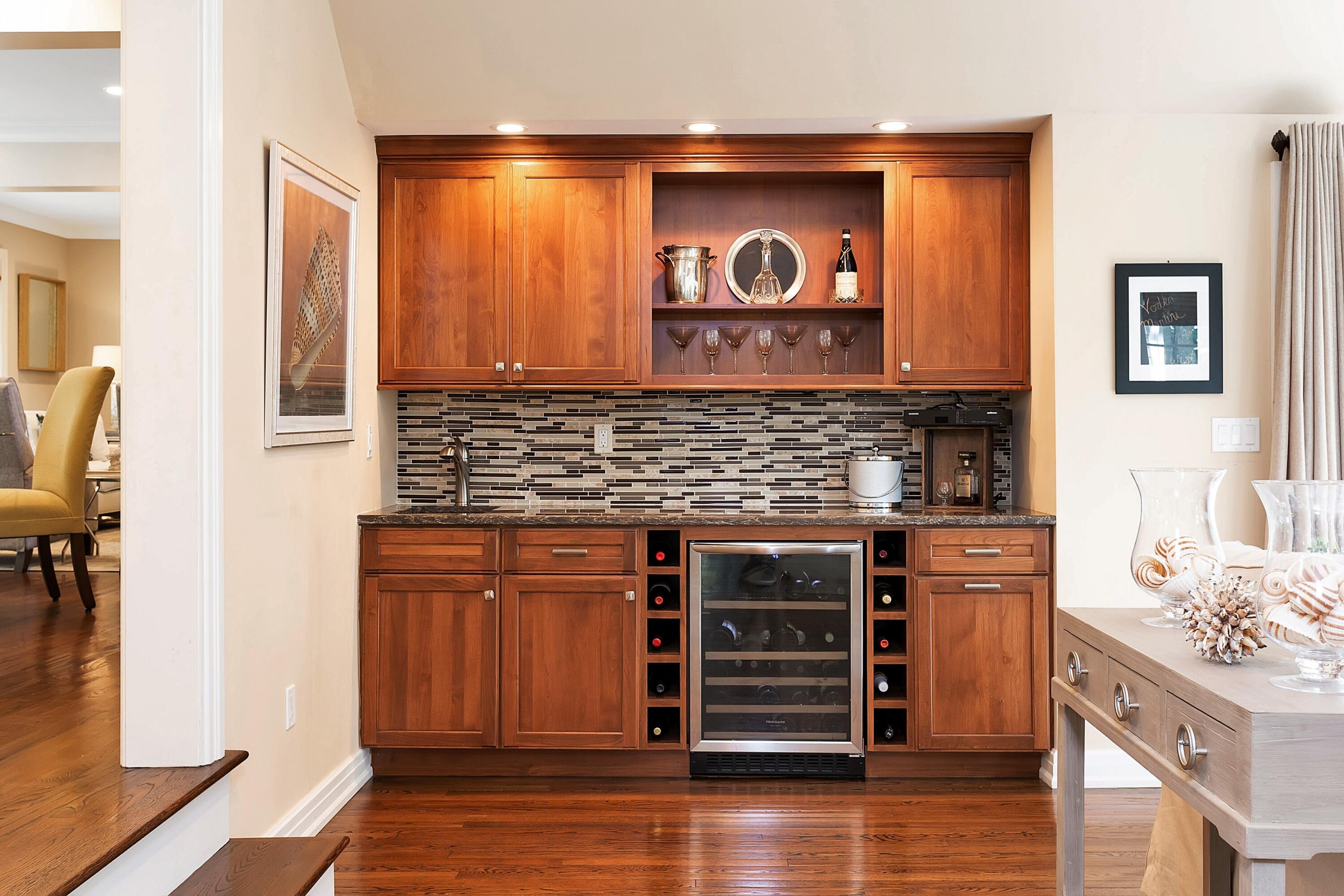 2 Cedar Gate Road Darien, CT 06820 - Photo 17 of 42 a kitchen with stainless steel appliances wooden cabinets and a stove top oven