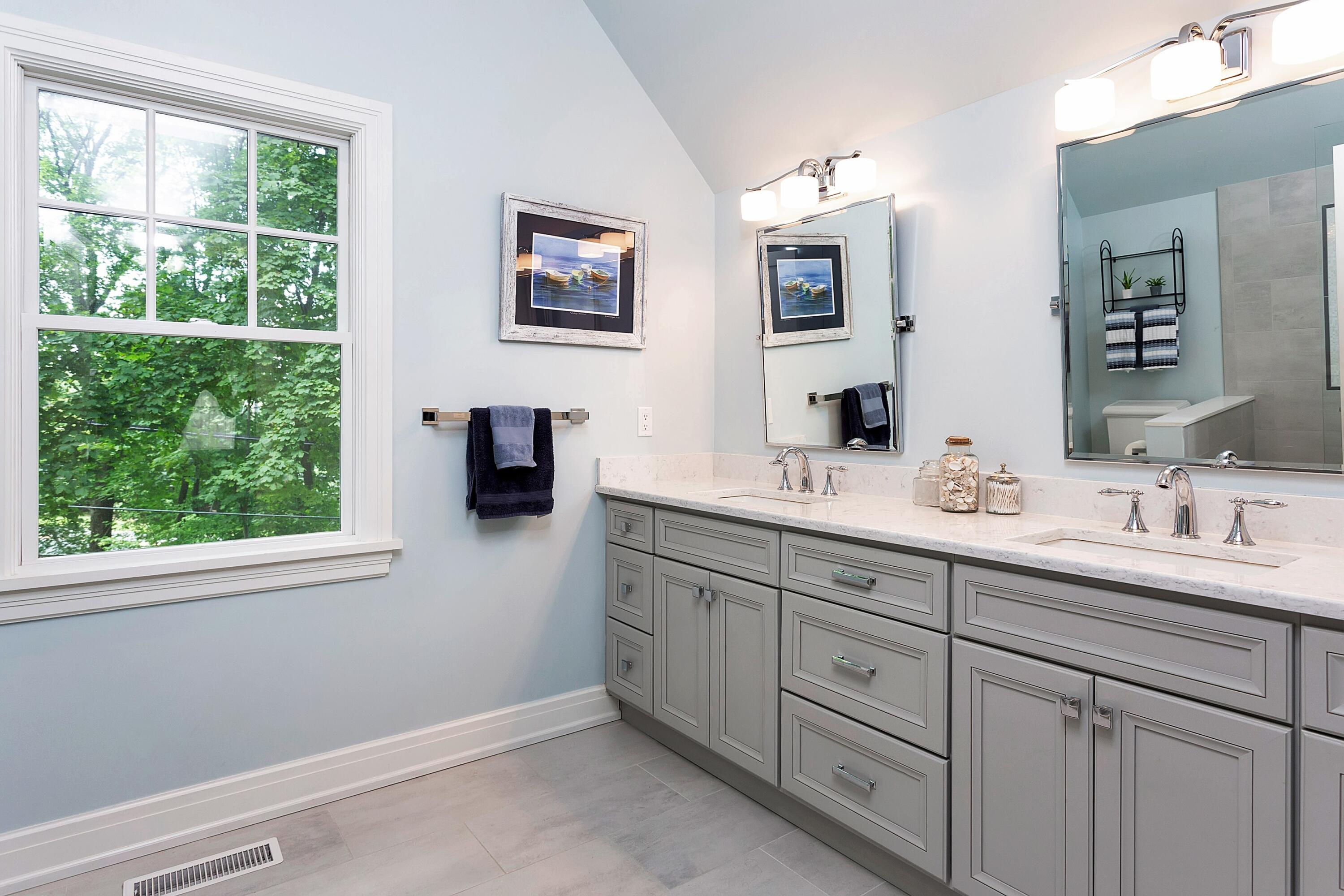 2 Cedar Gate Road Darien, CT 06820 - Photo 22 of 42 a bathroom with a double vanity sink and mirror