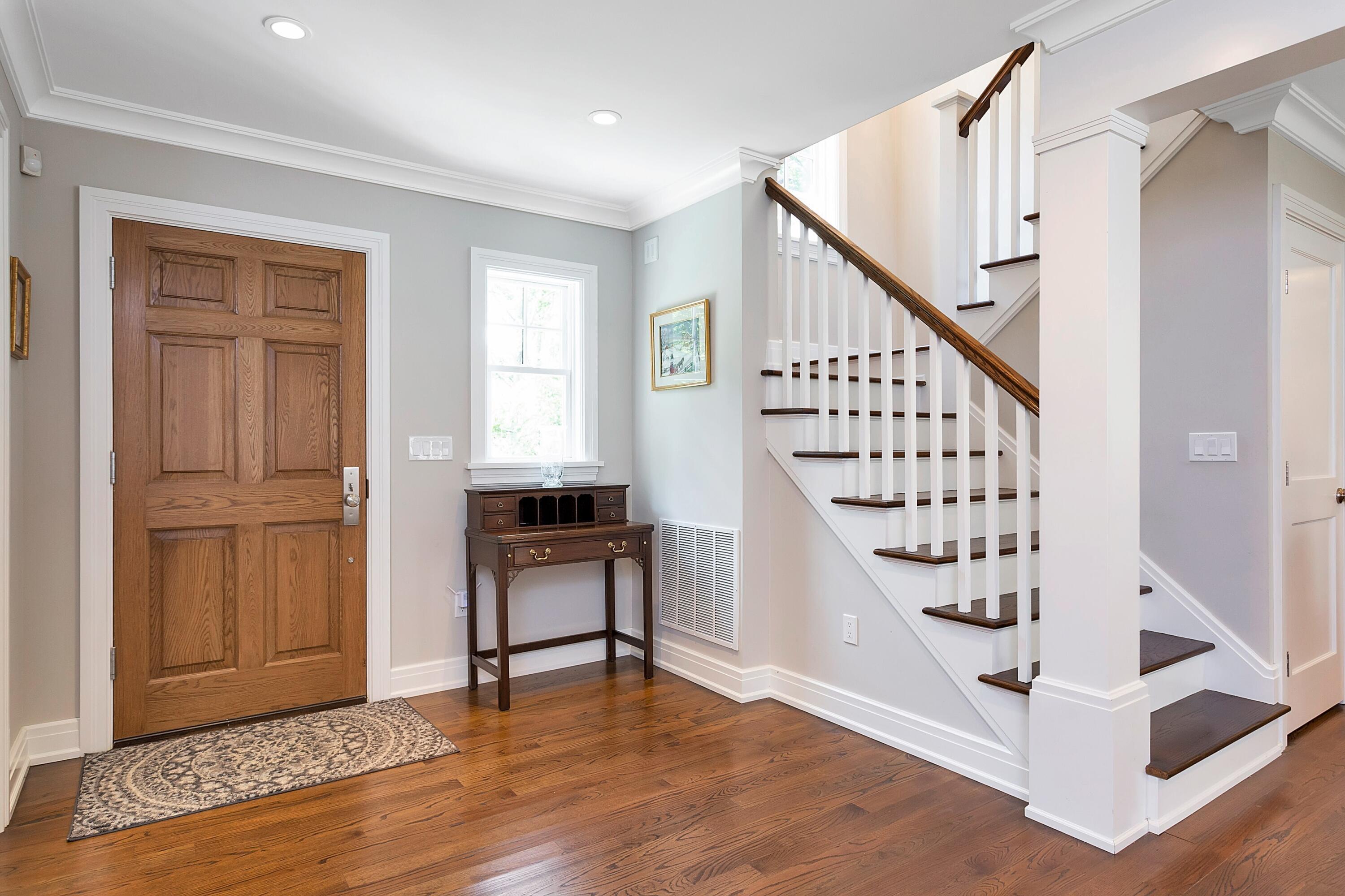 2 Cedar Gate Road Darien, CT 06820 - Photo 25 of 42 a view of entryway with wooden floor and stairs