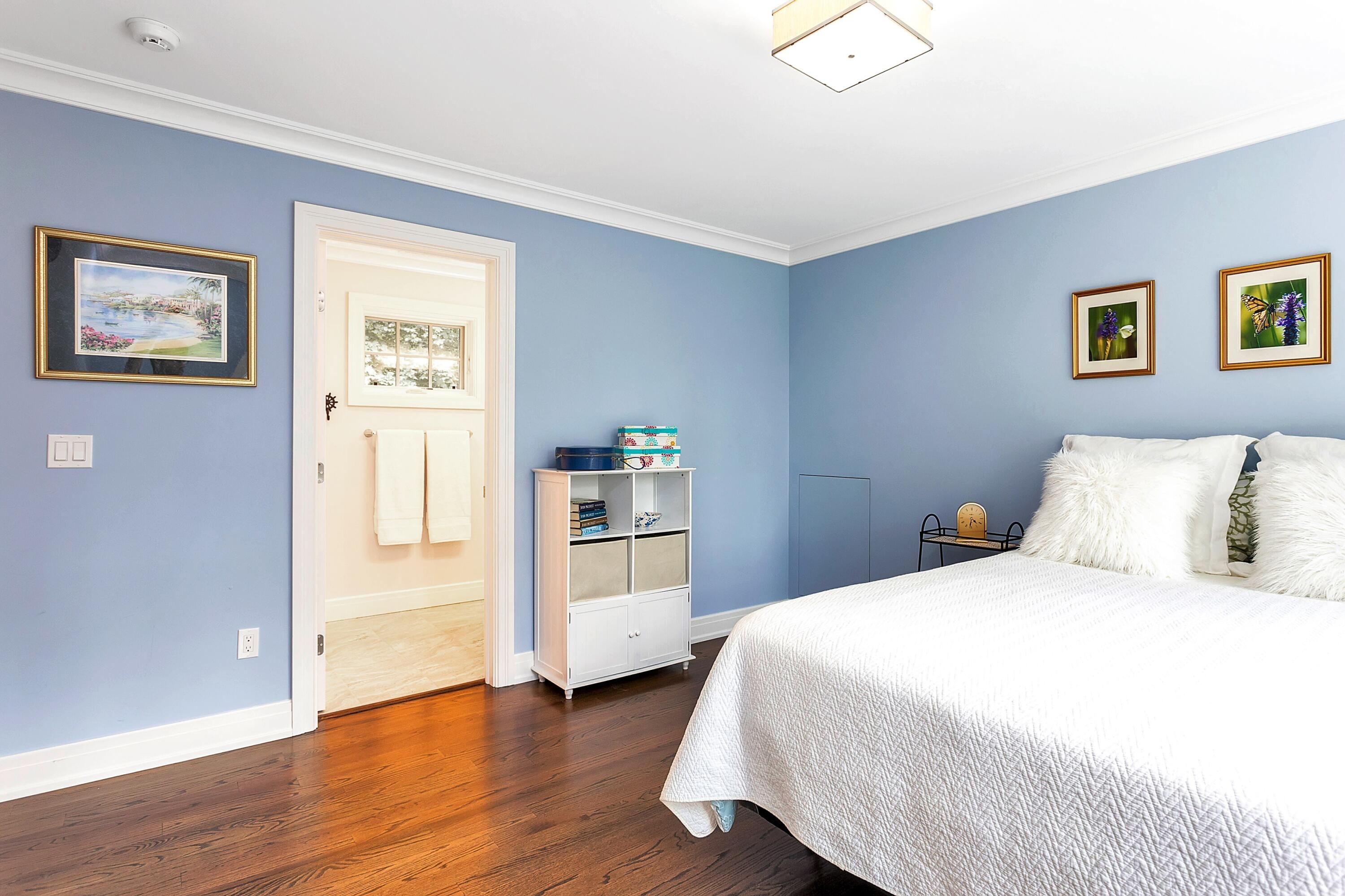 2 Cedar Gate Road Darien, CT 06820 - Photo 31 of 42 a bedroom with a bed and a view of kitchen