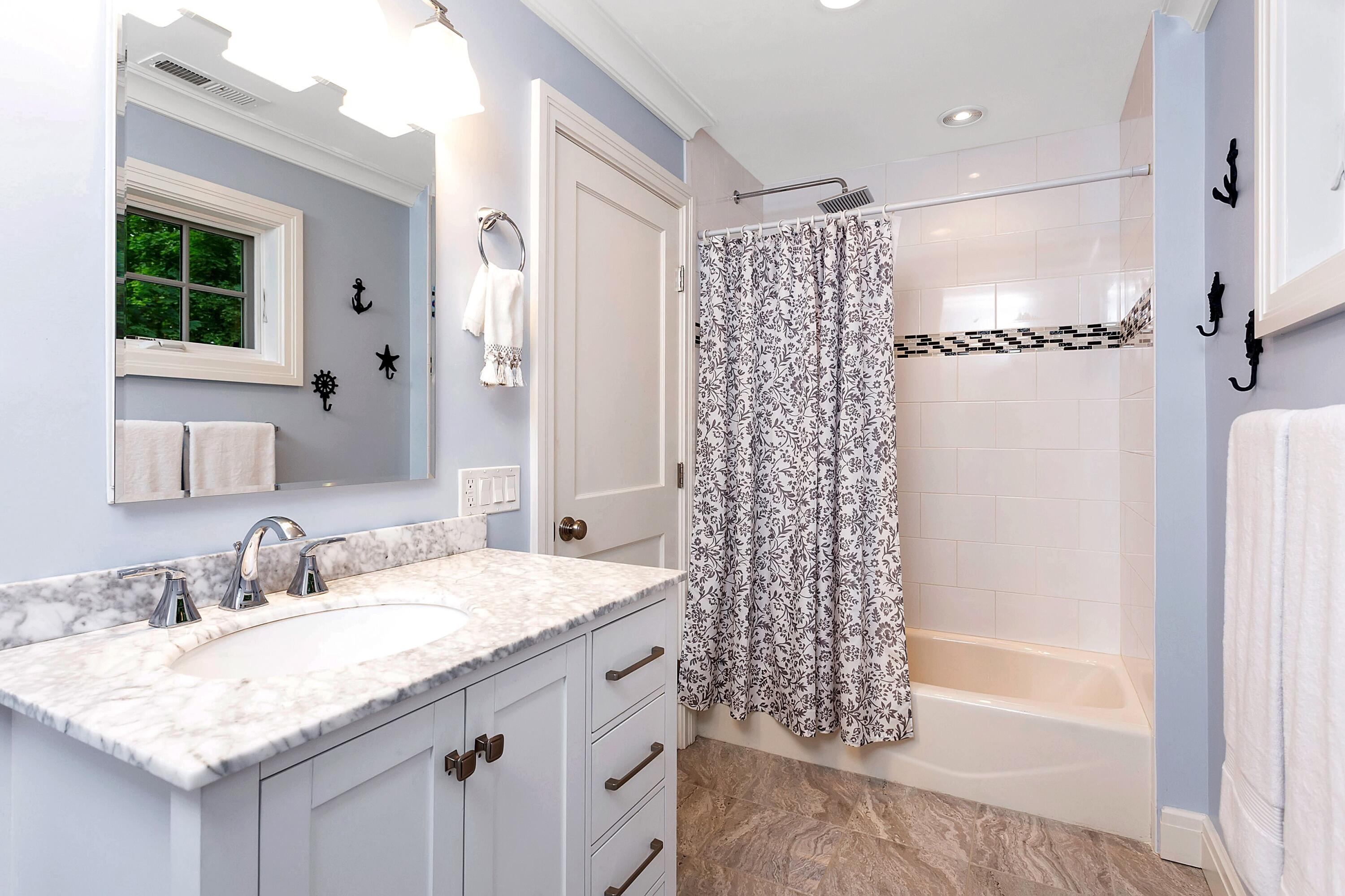 2 Cedar Gate Road Darien, CT 06820 - Photo 32 of 42 a bathroom with a granite countertop sink a shower and a mirror