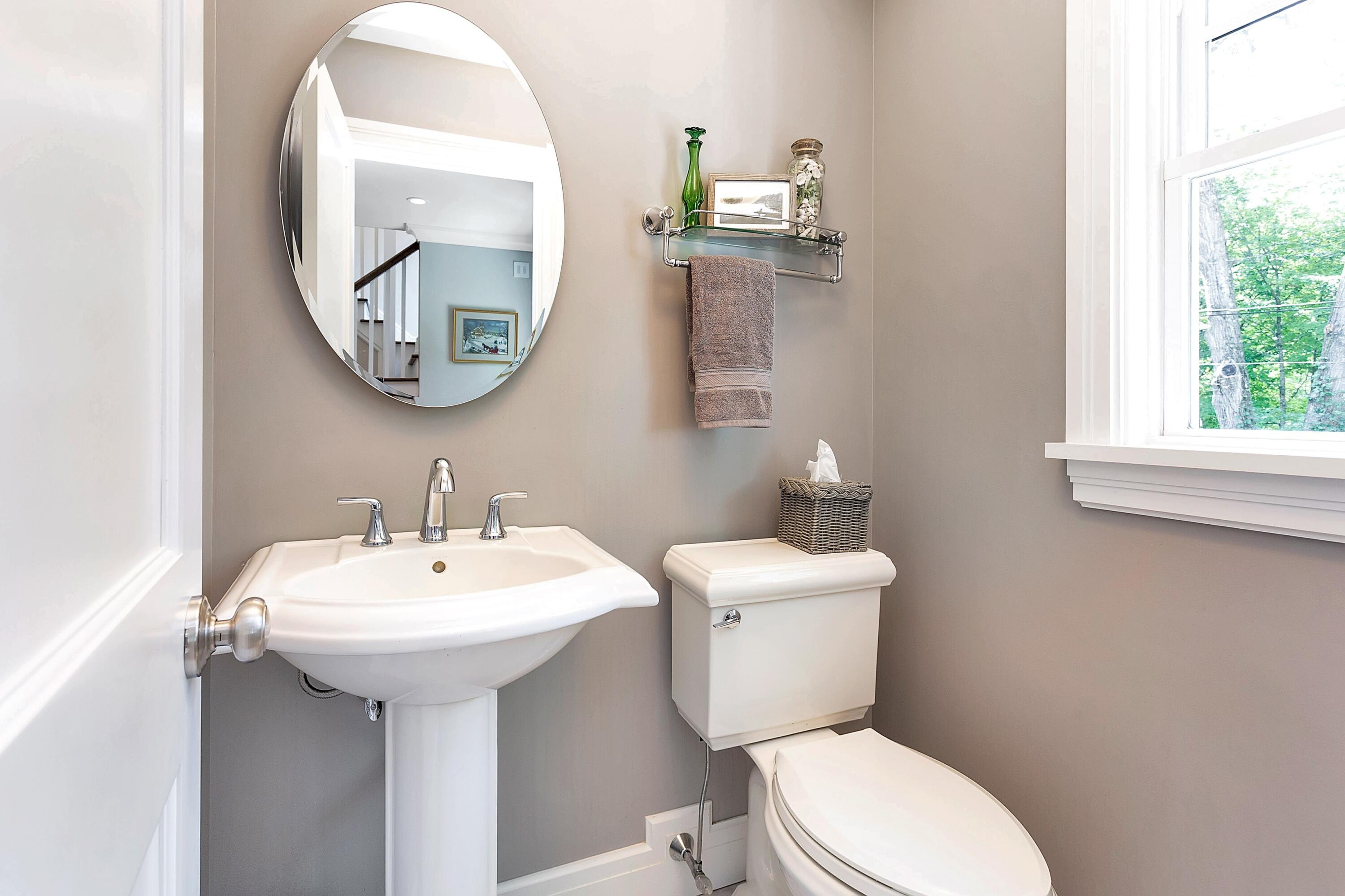 2 Cedar Gate Road Darien, CT 06820 - Photo 35 of 42 a bathroom with a toilet a sink and a mirror
