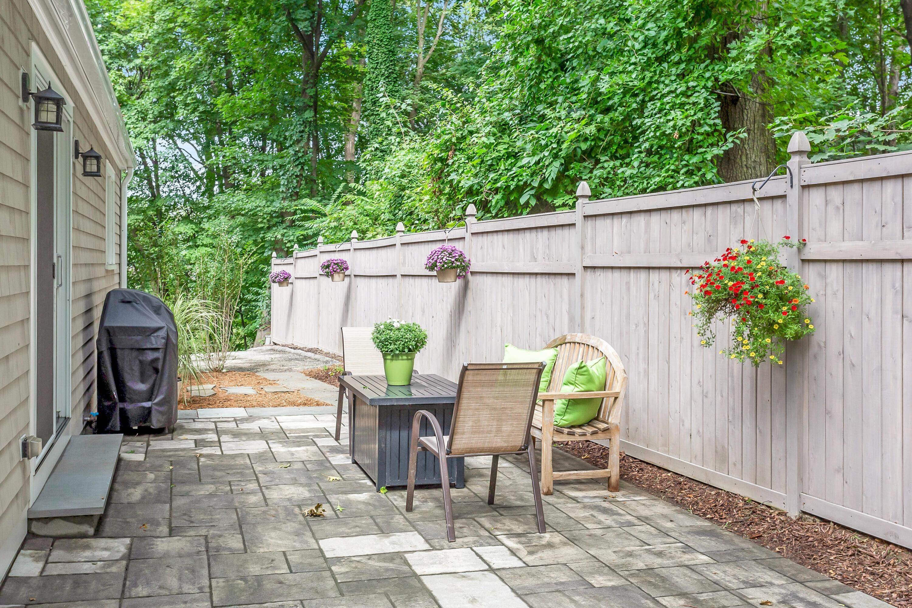 2 Cedar Gate Road Darien, CT 06820 - Photo 39 of 42 a view of outdoor sitting area with furniture and wooden fence