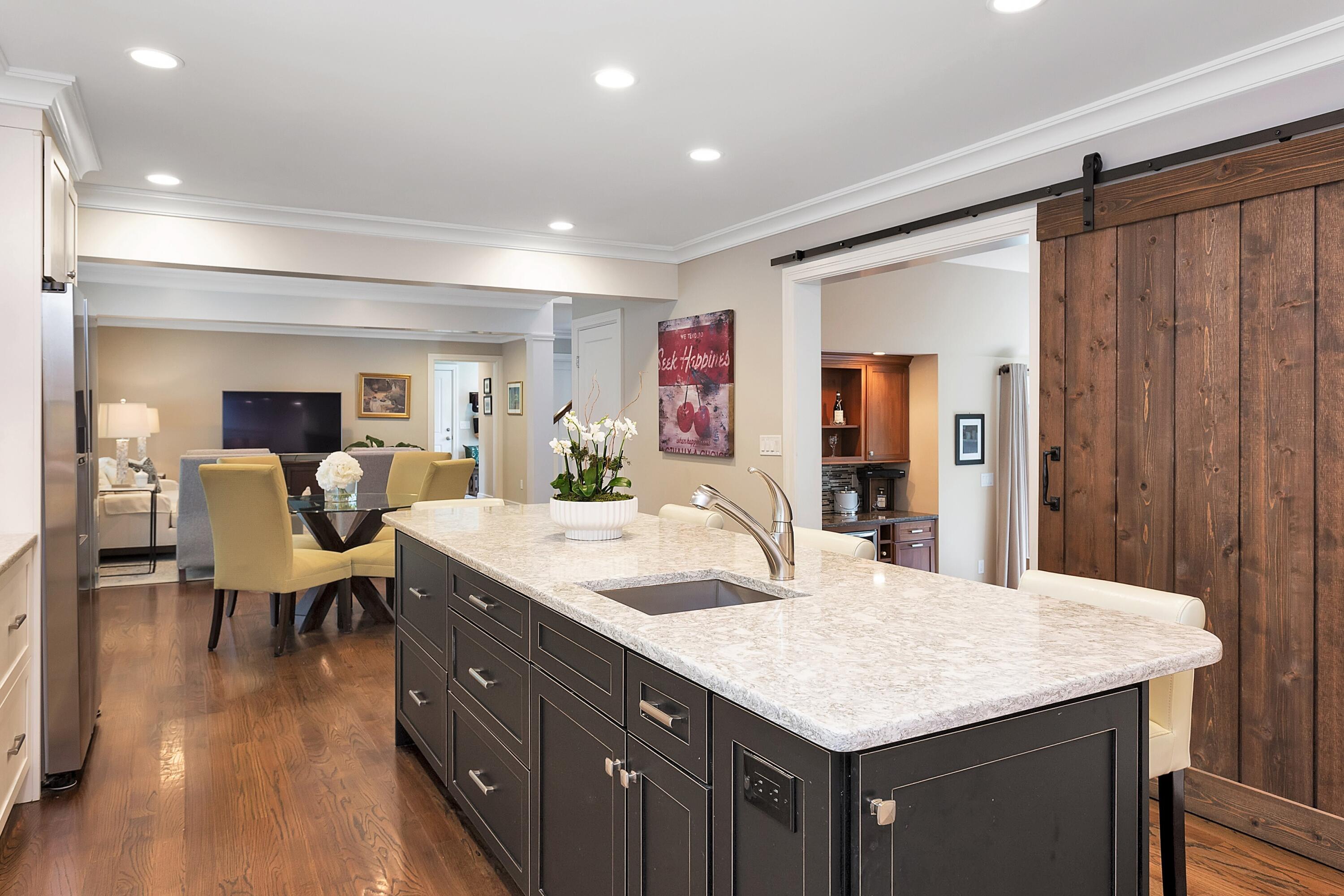 2 Cedar Gate Road Darien, CT 06820 - Photo 7 of 42 a large kitchen with kitchen island a sink table and chairs