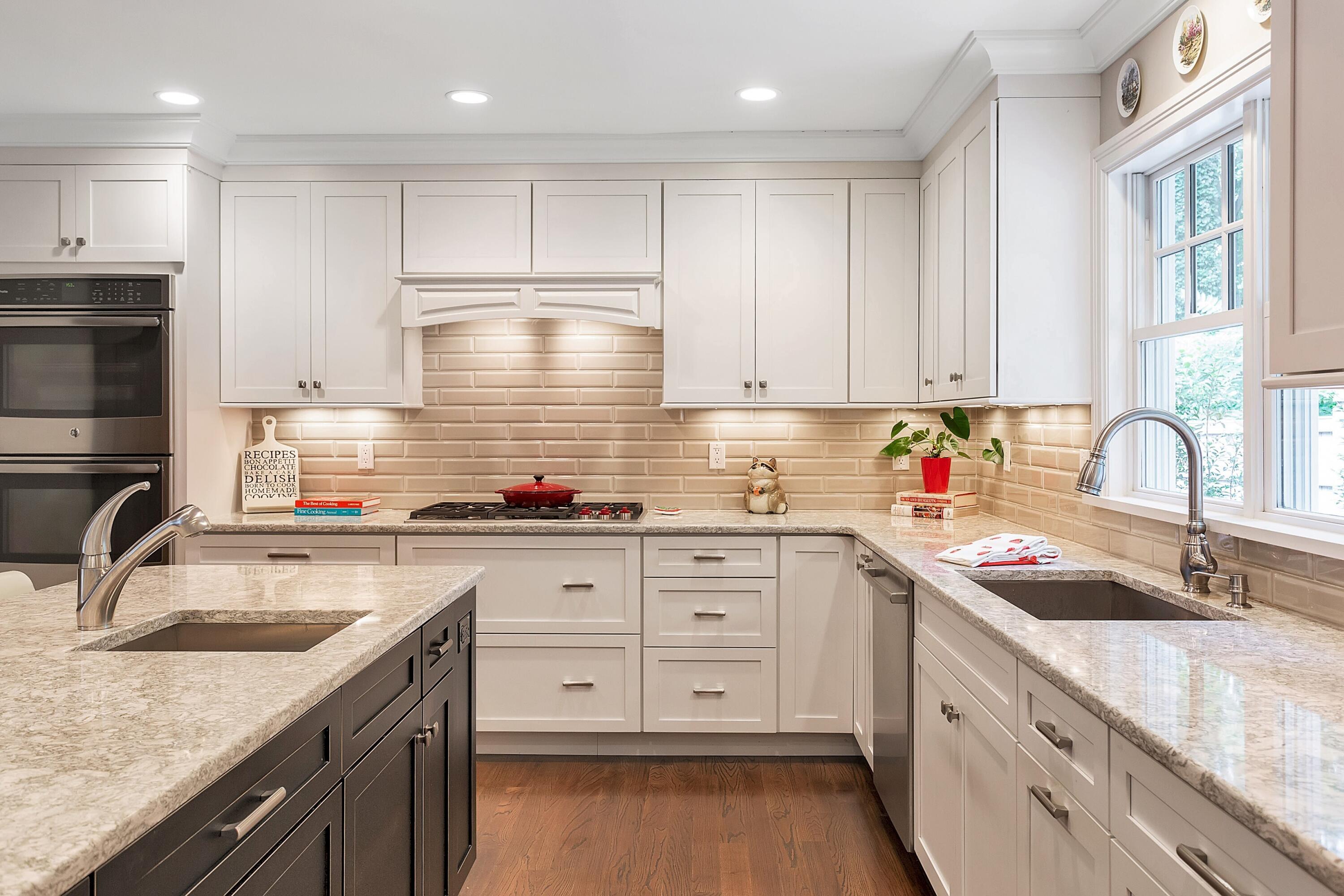 2 Cedar Gate Road Darien, CT 06820 - Photo 9 of 42 a kitchen with kitchen island granite countertop a sink stainless steel appliances and cabinets