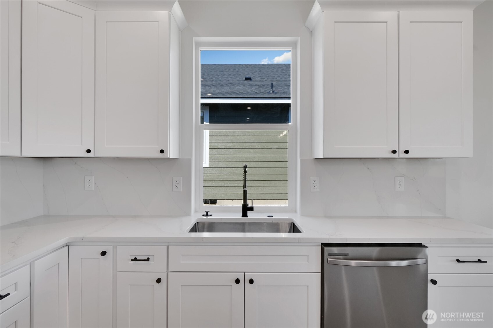 11 Parkside Loop Southeast Ephrata, WA 98823 - Photo 19 of 40 a kitchen with stainless steel appliances white cabinets and a sink