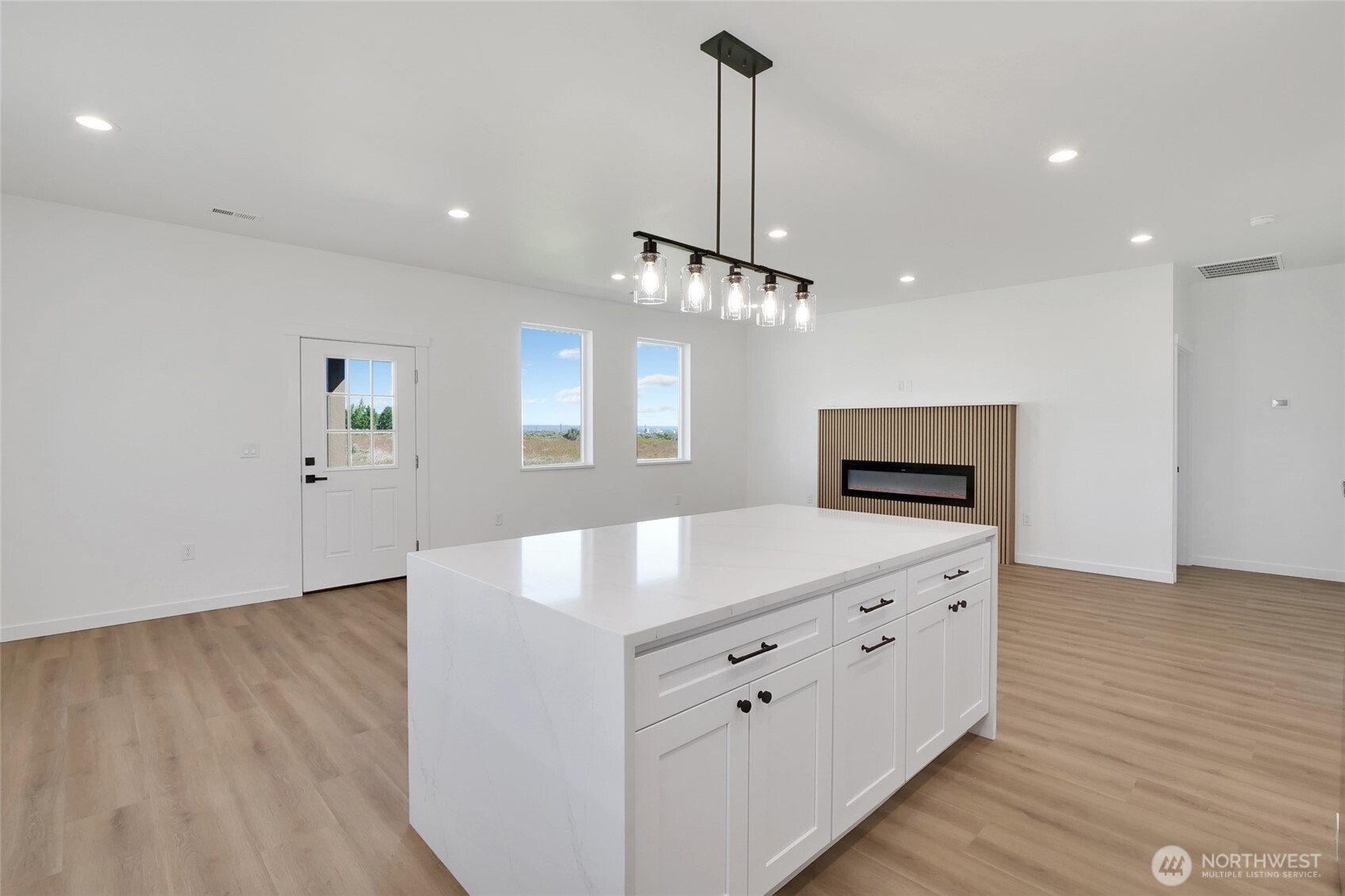 11 Parkside Loop Southeast Ephrata, WA 98823 - Photo 20 of 40 a kitchen with cabinets and wooden floor