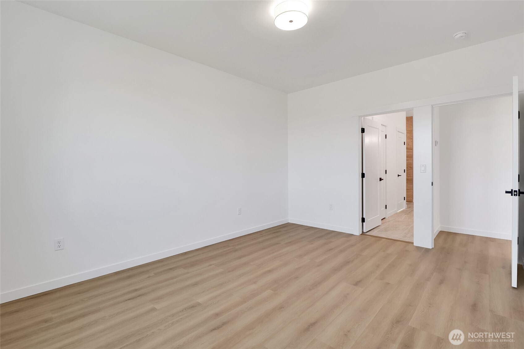 11 Parkside Loop Southeast Ephrata, WA 98823 - Photo 25 of 40 an empty room with wooden floor
